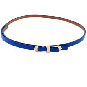 Royal Blue Skinny Belt With A Gold Bow Buckle